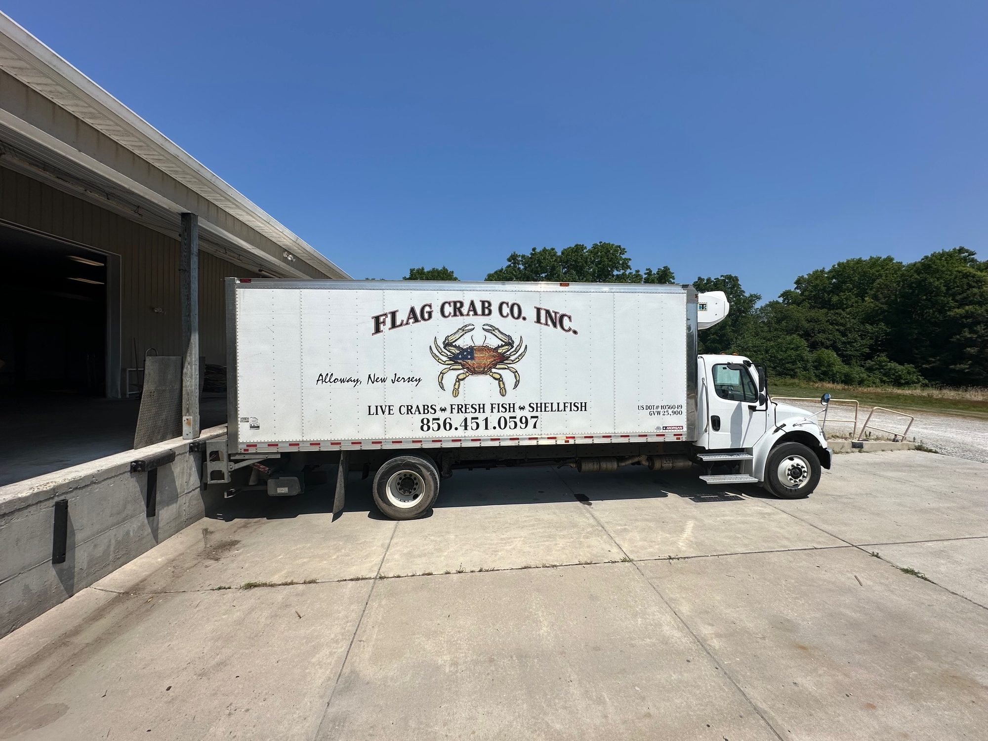 Flag Crab Co. Inc. box truck at the house